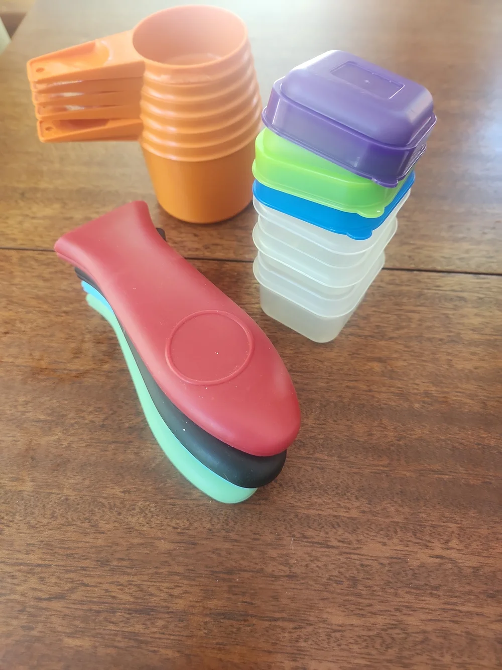 TupperwareOrange Plastic Measuring Cups Plus Other Helpful Kitchen Items